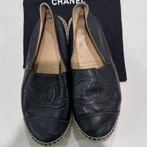Chanel black lambskin leather espadrilles featuring the iconic CC logo